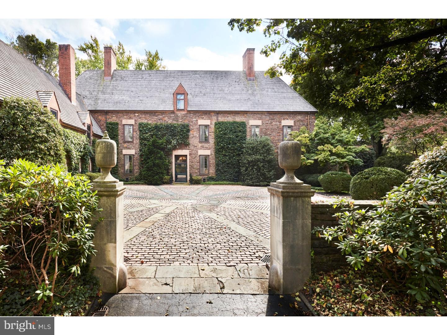 Rarely does such a significant historical treasure become available featuring exquisite and complete renovations throughout, while perfectly blending all original architectural designs, millwork, floors, moldings and materials with beautifully executed updates. Turn the key and move right into this breathtaking Mellor and Meigs French Country Manor property set on a private 3.91 acre lot within a quiet neighborhood, close to all forms of transportation, Center City Philadelphia, the airport and NYC. Fabulous features include soaring ceilings with original restored moldings, paneling and built-ins, gracious bright rooms for easy entertaining and comfortable living, floor to ceiling windows with original refurbished hardware and French doors leading out to the private grounds, terraces, courtyards and pool, sun-filled Living Room, beautiful Dining Room, Mahogany paneled Library, 6 restored fireplaces, timeless Gourmet Kitchen and Butler's Pantry with mahogany custom cabinets, carerra marble countertops, 8 Burner Thermadore gas cooktop, Thermadore refrigerator/freezer, and 2 dishwashers, 7 spacious Bedrooms including 2 Master Suites, luxuriously renovated Baths, rich restored wide plank oak floors throughout, 4 Garage Bays, additional 4-car carport, secluded pool, new roof, updated systems, electric & plumbing, every detail and amenity. Move right in and enjoy this Philadelphia treasure.**Please contact Lisa Yakulis with any questions regarding this property**