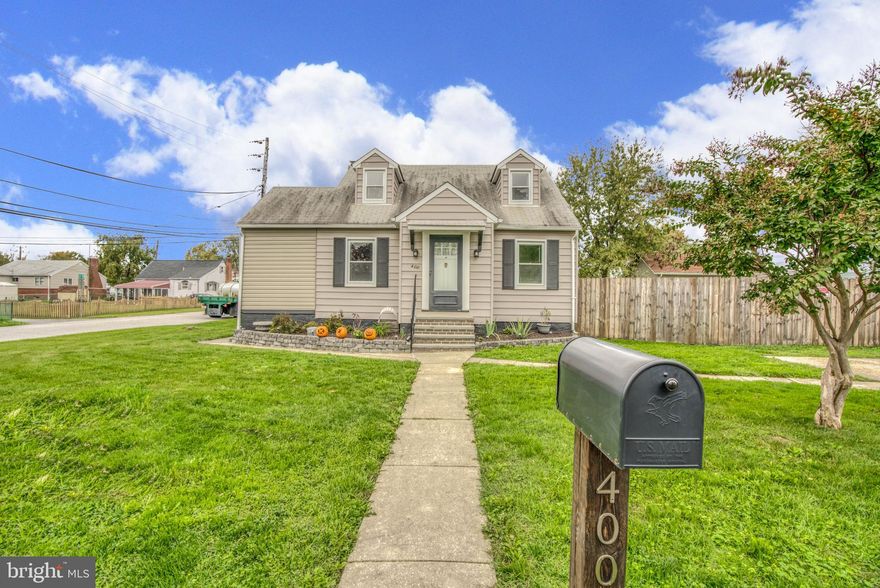 Home Sweet Home! Welcome to this charming and meticulously maintained 3 bedroom, 1.5 bath cape cod sitting on a spacious corner double lot! The main floor features newly refinished hardwood floors, an oversized living room with lots of natural light, a separate formal dinning room and tasteful neutral paint. The kitchen features new vinyl flooring, large stainless steel refrigerator, electric cooktop and wall oven. 2 spacious bedrooms and a full bath round out the main floor. The entire 2nd floor of the home is the master bedroom!! The unfinished basement with flush has a ton of potential. Use it for storage or finish it and add a media room, office or guest bedroom? Use the double lots to create your own little backyard oasis! Surrounded by a 6 ft privacy fence, the backyard features a large lush garden with trellis for grapes, 3 apple trees, a peach tree and plenty of space for cookouts, fire pits and other outdoor fun.  The 16x20 shed with electric has an attic area for storage and comes equipped with security motion sensors. Did I mention off street parking for up to 5 vehicles? This property has it all. See it today!