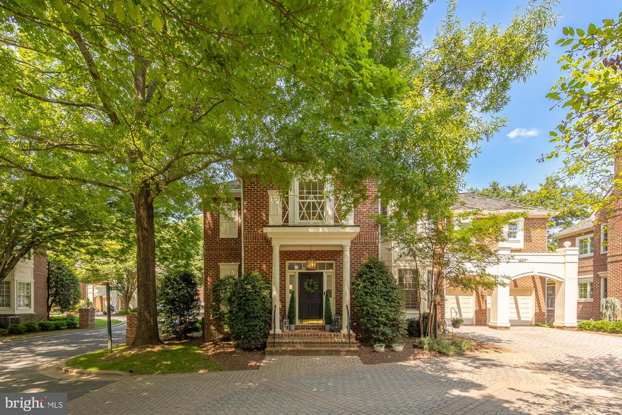 This exquisite brick residence is ideally located on a serene cul-de-sac with panoramic southern exposure, adjacent to open space near the 13th hole of TPC Avenel. The home features a sophisticated modern interior with white oak hardwood floors, chic updates, and a recently replaced cedar shake roof. Recent upgrades include a fresh coat of paint, new light fixtures, and updated HVAC system. The renovated gourmet kitchen is equipped with new JennAir appliances, custom cabinets, quartz countertops, and a built-in bench, all highlighted by stylish new lighting. The luxurious master bathroom boasts Porcelanosa tile, a Restoration Hardware vanity, and easy-to-clean quartz surfaces. A new full bathroom with floating double vanities and a custom-built wet bar in the basement add to the home's appeal. Outside, enjoy a low-maintenance slate patio, a motor court, and a fenced yard surrounded by mature trees. The property also features new gutters, a leak defense system, and recent exterior painting. Included with the home is a membership to the Avenel Swim & Tennis Club. This residence blends timeless charm with modern luxury, offering an ideal retreat.