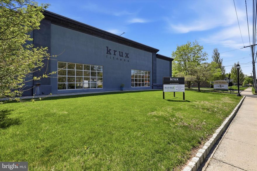 This is an excellent commercial investment opportunity featuring a well-maintained, single-level building with a long-term tenant in place. The property is currently built out as a fitness facility, including a full-size basketball court, dedicated cardio area, free weight and strength training section, and space for group classes, offering a flexible and functional layout. The building also includes an on-site physical therapist, enhancing tenant use and appeal. With approximately 8 years remaining on the existing lease, this asset provides stable, long-term income in a strong suburban market.