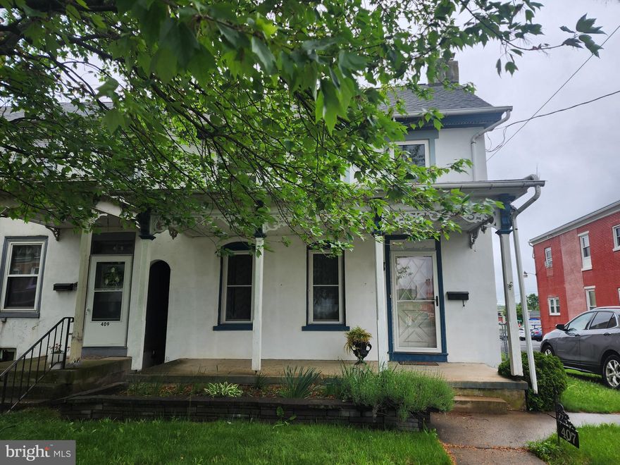 Great home right in the heart of town.  You will find a cozy living room, updated kitchen, laundry, and full bath on the first floor.  The second floor, there are 2 bedrooms and another bathroom.  The attic is finished with carpet, heat, and 2 closets.  Excellent flexible space! You will enjoy the fenced-in yard and 2 car garage. Come check it out.