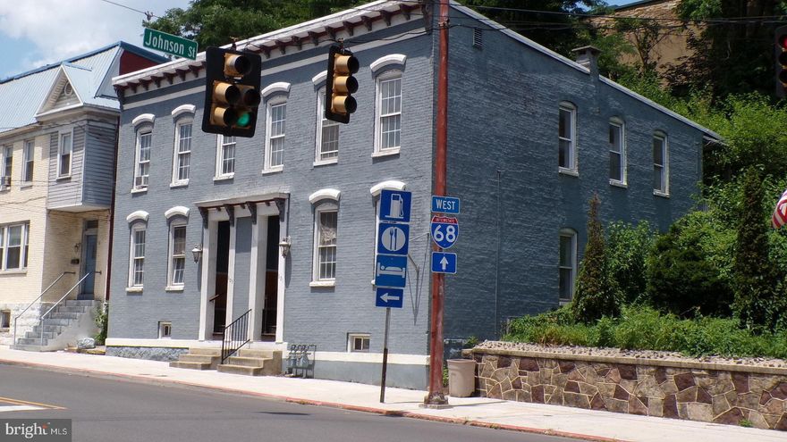 Investors Alert!! Statley brick duplex in the heart of Cumberland Md. Home of the Western Maryland senic railroad line with in walking distance as well as the C & O canal for walking or biking. Roughly a ten minute drive to Rocky Gap State Park and Rocky Gap Casino & resort. Convientely located a short drive to I68 for all your travel and or shopping needs.  The property features updates as follows: LVP flooring, bathrooms remodeled and kitchens as well. Each side offers three bedrooms, living room, formal dining rooms.