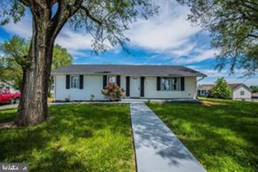 This lovely Ranch sits on a corner lot with .54 ac.  All new Appliances, Paint, Flooring, Roof, Flooring, Heat Pump and much more.  This home has everything that you need.  Very large living room, upstairs laundry, and full unfinished basement.  This home won't last.