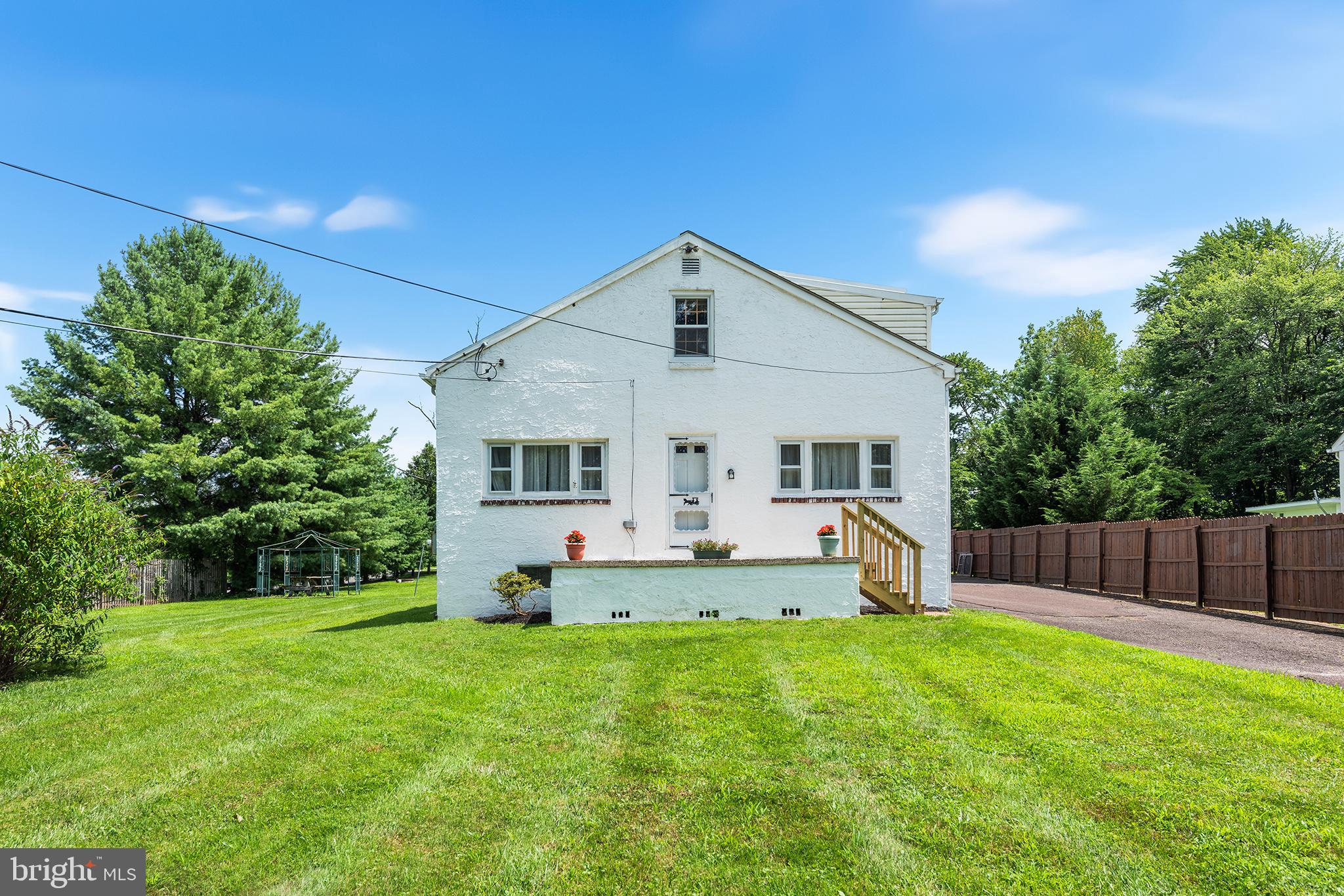 Welcome to 484 Fruit Farm Rd., located in the desirable Upper Providence Township within the award-winning Spring-Ford School District! This charming Colonial sits on just under an acre on a quiet residential street and offers endless potential. With 5 bedrooms and 2 full bathrooms, this home is filled with character and ready for your personal touch. As you step into the family room, natural light pours in through large windows, creating a bright and inviting space. Original hardwood floors lie beneath the carpeting and extend throughout most of the home, waiting to be revealed and restored. The spacious dining area is perfect for entertaining, with room for a full dining set, buffet, or hutch—ideal for hosting family gatherings and holiday meals. The kitchen offers ample cabinetry for storage and space to add a small island or breakfast table. Conveniently located nearby is access to the basement and a door to the backyard, making unloading groceries a breeze. The first floor also features a full bathroom and two bedrooms, offering flexible living options—perfect for a guest suite, home office, or in-law arrangement. Both bedrooms have closets and ample space for furnishings. Upstairs, you’ll find an open landing area that can be used as a study, sitting area, or potential extra room. Two generously sized bedrooms feature closets and skylights, filling the space with natural light. A third room at the end of the hall makes a perfect nursery, additional bedroom, or home office. Hardwood flooring continues under the carpeting on the second level, with the exception of the nearby full bathroom. A utility room is also located upstairs, offering additional storage and access to HVAC components. Outside, enjoy a spacious yard perfect for outdoor activities and entertaining. A large detached garage provides ample storage or a great setup for a car enthusiast. With plenty of parking, this home is ready to host family and friends with ease. Lovingly cared for by the same family for many years, this home has been the setting for countless gatherings and celebrations. Don’t miss the opportunity to make it your own—schedule your tour today and discover the charm and space 484 Fruit Farm Rd. has to offer!