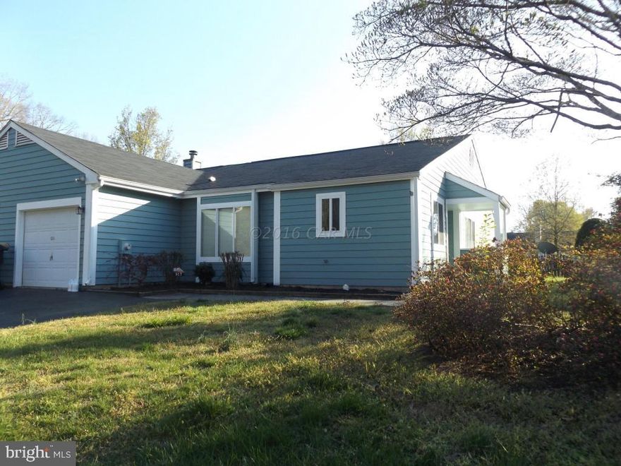 Renovated lovely duplex in Spring Chase-true 3 bedroom with a sunroom and attached one car garage--New stainless appliances, granite counter tops, hardwood floors and new carpet plus 28ft new fully fenced deckCall Listing Agents for financing details