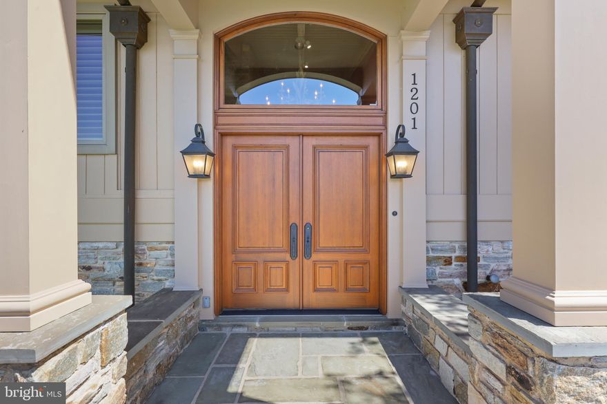 1201 Doves Cove Road is an updated unique, contemporary, ultra sophisticated, home having a large split foyer with an open staircase, nestled in the prestigious neighborhood of Hampton and sited on one acre of land. The imposing fireplace wall of Butler stone goes from the lower level to the living room ceiling. Houses such as this rarely become available.  The stone-walled driveway ends with a wide parking area ending at an oversized three-car garage that has built-in cabinetry.  The customization in the home was accomplished using the highest grade of materials, design and efficiency, resulting in an eye-appealing combination of sophistication, practicality and comfort.  Come on in and enjoy the vaulted pickled wood ceilings which encompass the foyer, living room, dining room, den, and master bedroom.  Both the living room and den have imposing views of the valley. The large dining room which has access to both the side Trex deck and rear Pennsylvania irregular flagstone patio awaits your entertaining pleasure. This home has four bedrooms with three full updated bathrooms and two half baths.  On the main level is the master suite, which is divided between the sleeping, bathing, dressing and cosmetic areas.  Also, on the main level is an en suite guest bedroom and powder room.  The Chef’s dine-in kitchen, featuring high-end cabinetry, GE Monogram stainless steel appliances, granite counters, and a wet bar, including a wine cooler, is a culinary haven with an elegant touch.  The laundry room with cabinetry is situated off the kitchen.  Upon exiting the kitchen, you find yourself on an expansive flagstone patio ideally positioned to enjoy serene views of nature and showcasing a hillside of exquisite landscaping with an ascending pathway revealing different settings at each turn.  A covered deck off the den faces west whereby one can enjoy the gorgeous sunsets and which continues off the dining room, affording abundant space for outdoor dining.  The lower entry level from the garage showcases two bedrooms with a shared full bath, a family room, as well as a kitchen and a storage room with floor to ceiling shelving. 

There are many structural, architectural and cosmetic amenities to include:  plantation shutters, new Pella sliding doors off the den and the dining room, new Pella windows in the living room & den, new solid wood six-panel doors throughout, new garage doors. The kitchen was updated from the studs out, a Tamko Heritage 50-year fiberglass architectural shingle roof, with six inch copper gutters and copper Leader Conductor Heads at the front entrance, a new HVAC system installed in 2022. There is a generator for the few times the power goes out - the electric and telephone lines having been repositioned underground.  

This meticulously crafted retreat is a rare find, presenting an irresistible combination of privacy, luxury, and modern living in Hampton, convenient to shops, restaurants, excellent schools and everything that Towson has to offer.  Come see for yourself.