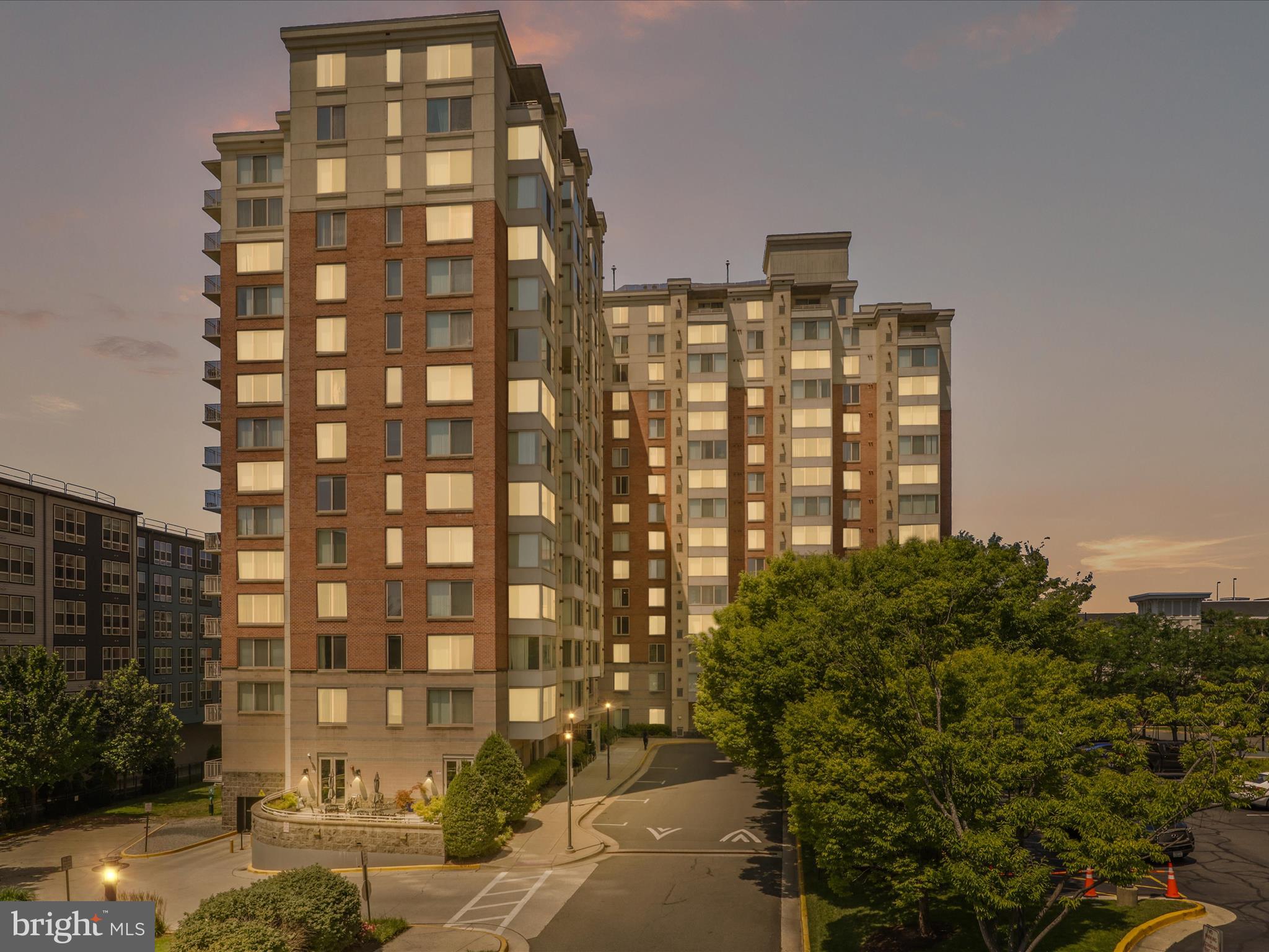 Welcome home to this spacious 2 bed, 2 bath condo with a desirable location. Walk to Metro, Harris teeter, and other shops right around the corner. The condo has very spacious bathrooms and bedrooms, Walk in closet in primary suite. Washer and Dryer in unit. Ceramic tile in baths and kitchen with engineered wood in the rest of the condo. Granite countertops in the kitchen. The amenities include rooftop pool, meeting room, party room, business center and fitness center all in the building. It includes 2 assigned parking spaces in the parking garage attached. Come see it anytime with your agent or Sunday (6/29) 1-3 at the open house