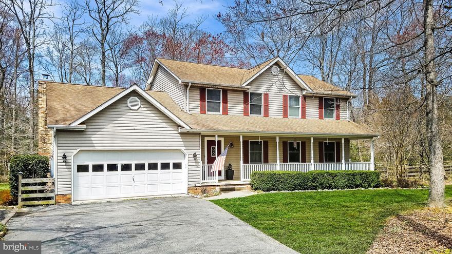 Lovely, Well Maintained Home on a Beautiful Corner Lot on 2 Acres in sought after Cox s Run. Open Floorplan with Hardwood Floors. Cozy Family Room has Vaulted Ceiling and a Wood Burning Fireplace. Bright Kitchen with Stainless Appliances and Tiled Countertops. Large Living Room and Formal Dining Room.  Enchanting Master Bedroom with Walk-In Closet and En-Suite Bathroom with Double Vanity and Oversized Two Person Shower.  Huge Screened-In Porch, Deck and Welcoming Covered Front Porch. Two Car Garage and Tons of Parking. Charming!