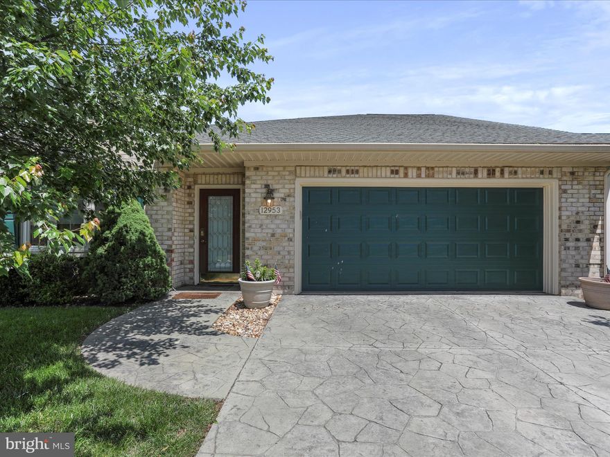 Welcome to easy, one-level living in this beautifully maintained end-unit condo located in the desirable Cortland Manor community. This 2-bedroom, 2-bath rancher-style home features an open floor plan, creating a spacious and inviting atmosphere perfect for everyday living and entertaining. Built in 2006, it boasts LVP flooring throughout for a seamless, low-maintenance living space. The eat-in kitchen is a standout with granite countertops, ample cabinet space, and room to gather and dine. The primary bedroom offers a private attached bath with a relaxing whirlpool tub and direct access to the backyard patio—ideal for enjoying your morning coffee or unwinding in the evening. The second full bath was recently upgraded in 2024 with a new walk-in shower with handicap-accessible rails for added safety and ease. Enjoy peace of mind with a brand-new HVAC system (2024), a spacious 2-car garage, and an interior sprinkler system for enhanced safety. Prime location near stores, shopping, and dining. Whether you're downsizing or simply seeking a low-maintenance lifestyle, this property has it all. Don’t miss out - schedule your private tour today!