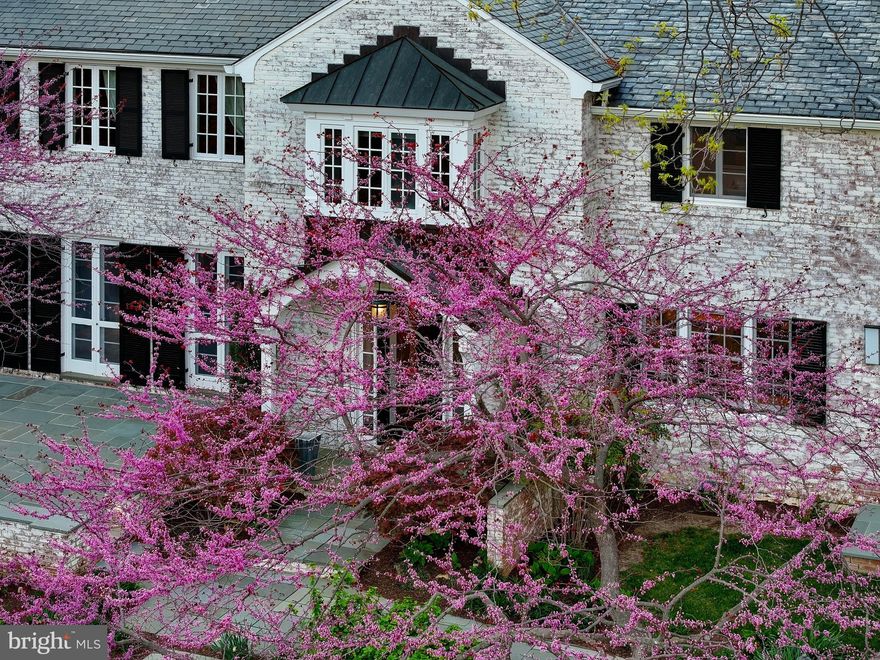 Live authentically. A rare offering on coveted Stewart Rd. Relish the scenic drive and sense of arrival at your timeless brick traditional. Peacefully perched on 2.97 acres, enjoy views of your very own private storybook setting in the heart of Stevenson. Ignite your culinary creativity in the bright and light kitchen that connects to a warm and welcoming great room with wooden beams. Get together for celebrations and meals in the dining room with an impressive stone fireplace and doors that open to the outdoor terrace. A perfect gathering place where friends can pour both inside and outside. Pause and take in the sweeping front yard views. A blooming landscape surrounds you. Seamless flow on the first floor with a study, stylish bar and multiple spaces for lounging and relaxation.  Grill on the stone terrace while soaking in the privacy of your lush backyard. A finished basement with plenty of storage and space for a wine room. House comes with a generator. Close to everywhere you want to be. Verizon Fios Internet. Cultivate your existence. The art of uniting human and home.