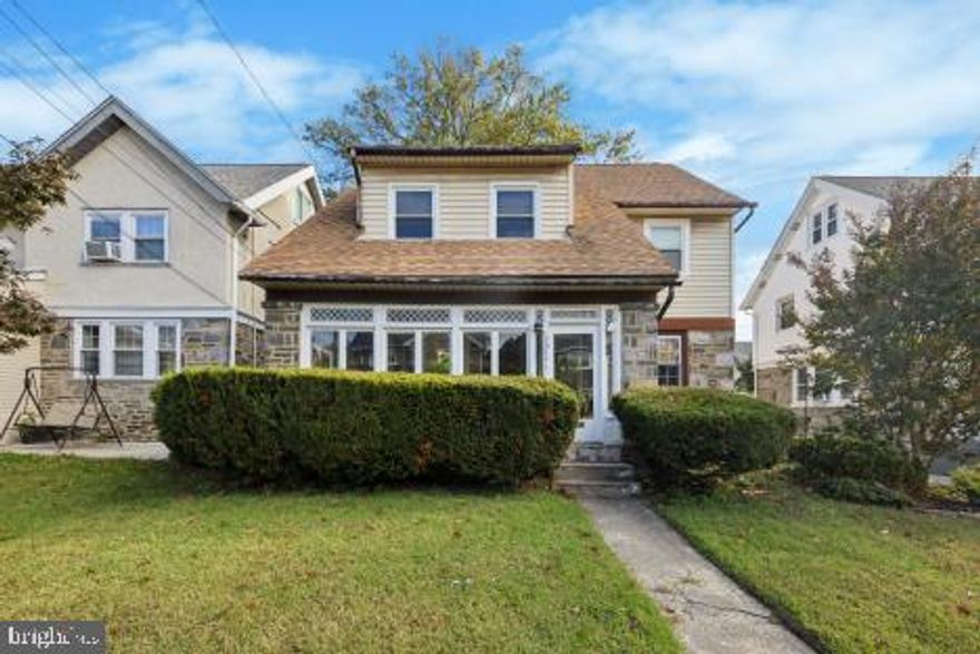 Welcome to this spacious 4-bedroom, 2-bath stone Colonial located in the desirable Beverly Hills section of Upper Darby. Built in 1928, this classic home offers 2,156 square feet of timeless character blended with modern updates.

Step inside through the stone-enclosed front sunroom, perfect for enjoying morning coffee or evening relaxation. The inviting living room features a beautiful fireplace and hardwood floors that flow into the formal dining room, ideal for entertaining. The updated kitchen offers modern finishes while maintaining the home’s original charm.

Upstairs, you’ll find four spacious bedrooms and a full bath on the second floor. The third-floor attic provides two additional rooms and another bathroom, offering excellent flexibility for a home office, studio, or guest space.

Enjoy outdoor living with a rear sunroom, private backyard, and detached garage. A newer concrete driveway provides off-street parking.

This classic Colonial combines historic charm, generous living space, and a convenient location close to shopping, schools, and public transportation—making it a perfect place to call home. While the home could benefit from a few cosmetic updates, it’s full of potential and ready for your personal touch. Solid bones, a great layout, and a prime location make this a fantastic opportunity to own a home with lasting value.