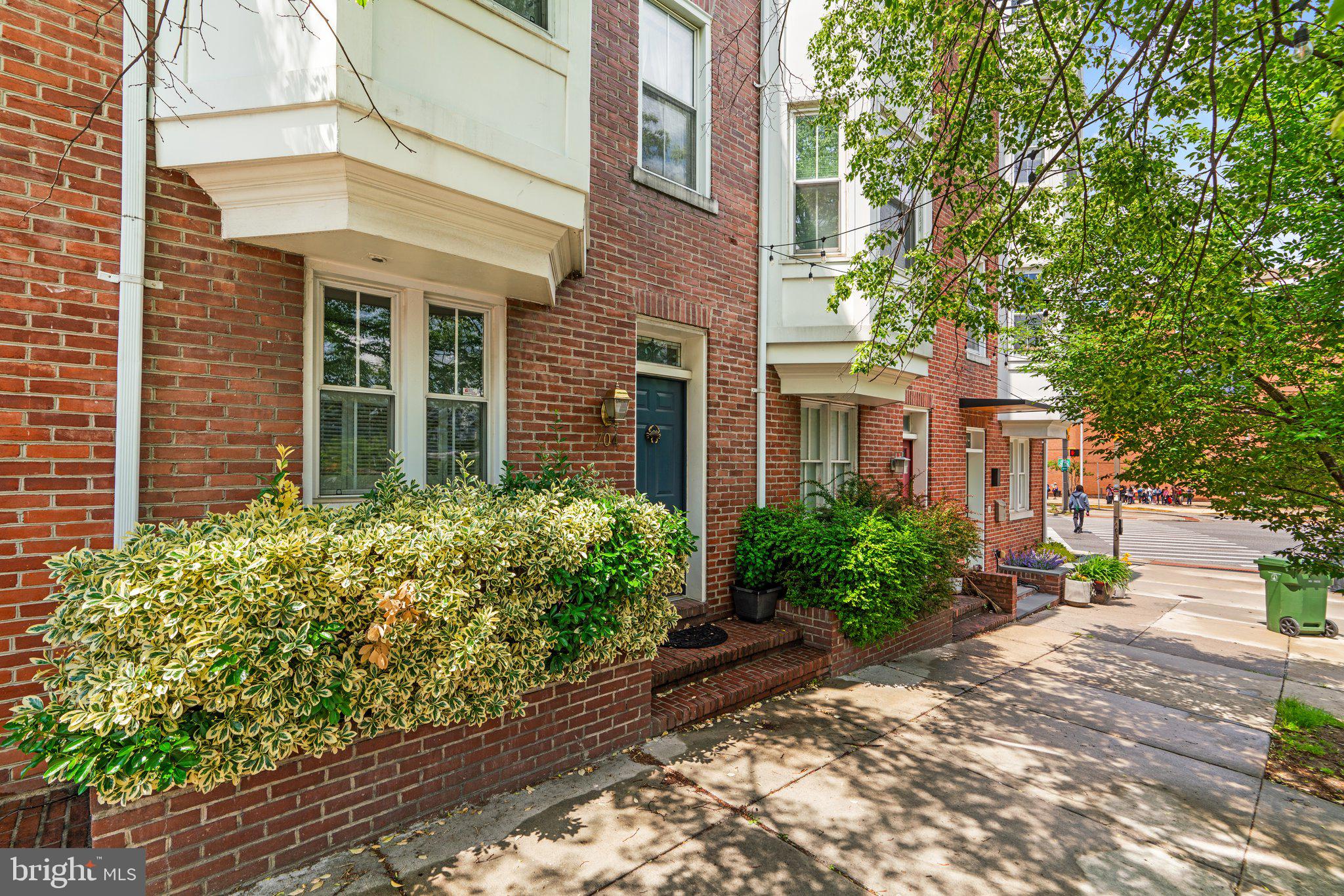 Welcome to this beautifully maintained 4-level townhome featuring incredible unobstructed Harbor water views in the heart of Federal Hill. Gleaming hardwood floors flow throughout, beginning on the entry level with a formal dining room, a convenient half bath, and a beautifully appointed kitchen featuring glass-front cabinetry, granite countertops, a detailed tile backsplash, a center island, and access to a private, charming patio—perfect for outdoor dining or quiet relaxation.
The first upper level offers two spacious, sun-drenched rooms—one with a cozy wood stove—ideal for a family room or home office. The second upper level is home to the generous owner's suite with ample closet space and a luxurious en-suite bath with a double sink vanity.
At the top level, you'll find a skylight in the hallway along with access to a showstopping rooftop deck where breathtaking panoramic views of the Baltimore skyline await. A second bedroom, full bath, and a sunroom with a wall of windows and access to a private deck, also with stunning city views, complete this level.
Located just minutes from the waterfront and the newly revitalized Rash Field Park, this home offers the best of city living—steps from restaurants, entertainment, and recreation, all right outside your front door.