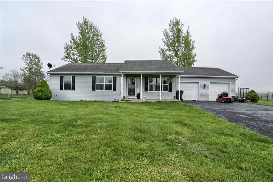 SCHEDULE A SHOWING NOW! YOU HAVE TO SEE IT TO BELIEVE IT! $0 DOWN USDA AVAILABLE! This home has been updated with all the high end amenities that you could ask for. Home features high end new hardwood floors throughout, new paint, striking granite counter tops, stainless steel appliances, large finished basement with all ceramic tile flooring, oversized 2 car garage, fenced in yard, maintenance free deck, large patio, great views of farm land!