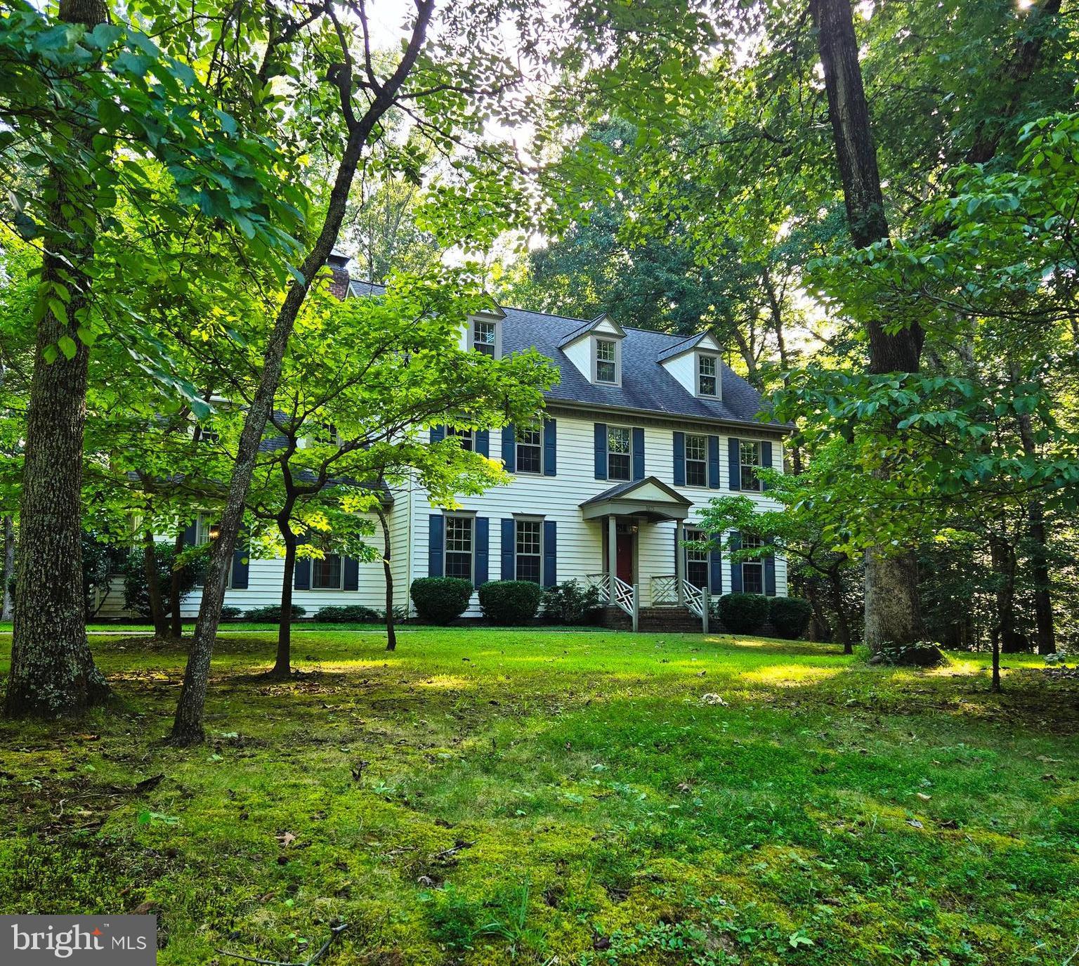 Wonderful Colonial with great space both indoors and out. Huge kitchen features great work space, a window seat and room to entertain. The lovely wallpaper and sconces in the dining room help to create a warm, dining experience. The family room with a walk-in fireplace has gleaming wood floors and is always a welcoming room to enjoy. The elongated windows throughout the first floor provide lots of great light and views. The primary bedroom is a total living space in itself with a sitting area, room for large or minimal furniture, walk-in closet that has access to additional storage above the garage. Large landing and hallway is on this level making it convenient for moving around easily. The top level has a large bonus room with multiple dormers, great light and space to make it work just right for you. There is attic/storage space with dormers and the inside HVAC unit. Load of living/storage area in this beautiful, one owner home.