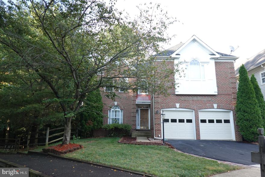 Single brick front colonial home located on cul-de-sac in the quiet neighborhood. Minutes to Beltway/66/50/495 and Vienna Metro, Pan Am shopping center. Walking distant to Mosaic District, Dunn Loring Metro. Open floor plan, two-story ceiling with window treatment, sunlight, hardwood floors, island kitchen with breakfast table space, family room with fireplace, separate dining room. Main level library. 4 BR upstairs with 2 full baths, huge master bedroom with luxury bath and 2 walk-in closets. Walk-out basement with 3rd full bath, 5th bedroom and large recreation room with exit to fenced back yard.
