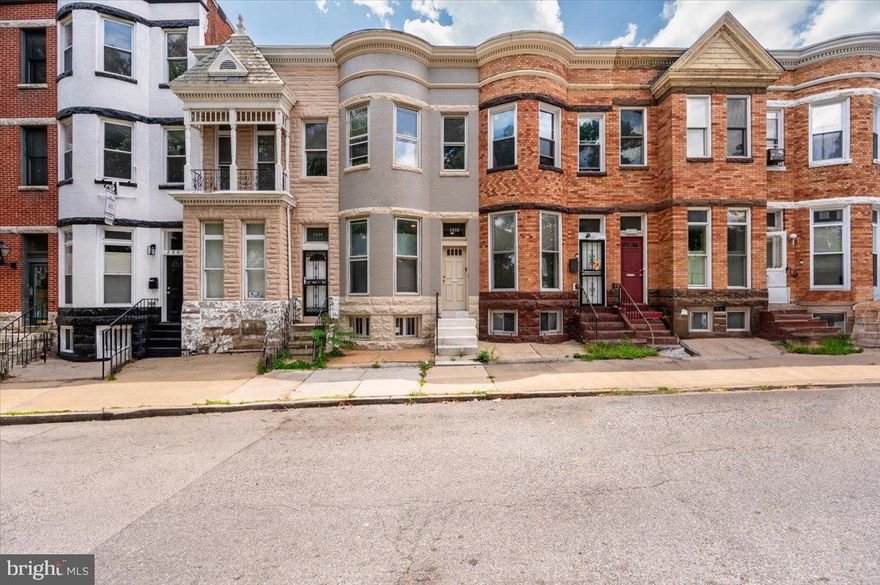 **Owner extending a one-year home warranty and closing assistance**
Priced Improvement.... Stunning Newly Remodeled 3-Level Townhome
Prime Location Across from Druid Hill Park/Reservoir Hill.  Nestled in a tranquil, park-like setting, this stunning home offers the perfect blend of city living and natural beauty. Enjoy breathtaking views of Druid Hill Park, the Maryland Zoo, and Druid Lake right from your front window.

Discover your dream home in this meticulously renovated 3-level townhome, boasting an unbeatable location just steps away from the serene beauty of Druid Hill Park and the vibrant Reservoir Hill neighborhood.

Elegant Living Spaces: Open floor plan, separate living and dining rooms, and a sun-filled sunshine room off the kitchen create a perfect blend of style and functionality.
Modern Kitchen: A chef's delight featuring all-white soft-close cabinets, gleaming granite countertops, a gas stove, and stainless-steel appliances. Indulge in the warmth of a marble fireplace, the soft glow of recessed lighting, and the comfort of fresh paint and plush carpeting throughout.
Spacious Bedrooms: Three generously sized bedrooms offer ample space for relaxation and privacy.
Updated Systems: Enjoy peace of mind with an up-to-date furnace and water heater.
Potential for Expansion: The basement presents an opportunity to create a half bathroom and additional living space. 

Don't miss this incredible opportunity to own a beautifully remodeled townhome in one of Baltimore's most sought-after locations.     Druid Hill Lake is currently in the middle of a multi- million-dollar overhaul, which will add new recreation and entertainment areas. Schedule your showing today!