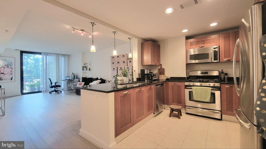 Available immediately. One bedroom plus a flex room, and one full bath with a balcony! Washer/dryer in unit. Assigned garage parking on the same level. Metro across the street for easy commute into DC. 

Don’t miss the opportunity to live in this beautiful condo at Midtown Alexandria Station. This unit has one of the most desirable floor plans in the building, a one bedroom with a flex room for extra space to work from home or for an overnight guest for a total of 975 square feet. It faces southeast, towards the quiet side of the building, which is a huge plus. New floors and paint. A lot of natural light shines throughout the unit. The kitchen features granite countertops, lots of storage, and stainless steel appliances including a gas stove. The main bedroom is bright and complete with a walk-in closet and a full bathroom. The balcony adds extra space to relax and enjoy the quiet view. 

All this in a building with great amenities that include a gym, swimming pool, and concierge service. The Huntington Metro Station is just across the street! Midtown is close to Old Town Alexandria and major commute routes to DC and neighboring areas.