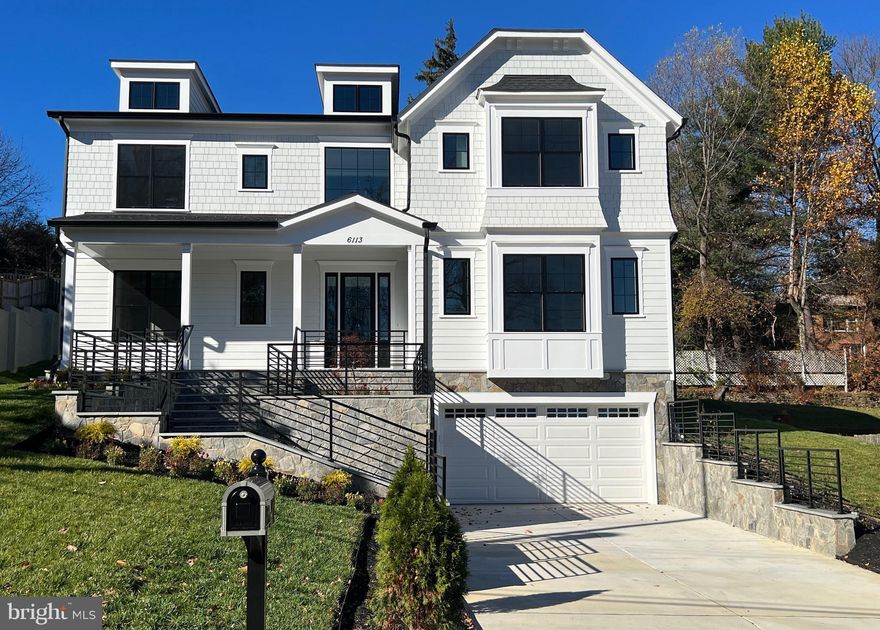 Step into the home of your dreams! This recently constructed, custom-designed masterpiece seamlessly combines modern luxury with timeless charm. Nestled in one of Bethesda's most desirable neighborhoods, this residence is a true treasure, marrying the convenience of city living with the serenity of suburban life.
Boasting an architectural design that skillfully blends contemporary elements and traditional aesthetics, this home showcases meticulous attention to detail, from its stylish exterior to its thoughtfully designed interior. With over 7500+ square feet of living space, a two-car garage, an elevator, and seven bedrooms with 7 1/2 baths, this house is attractively priced for a quick sale and represents the best value in its neighborhood.
Ideal for comfortable family living and entertaining guests, the residence features a two-car garage with a spacious storage area leading to a mudroom that connects to an elevator for easy access to different levels. The open-concept floor plan facilitates a seamless flow between the living, dining, and kitchen areas. The gourmet kitchen, a delight for chefs, boasts top-of-the-line appliances, custom cabinetry, and two islands—perfect for hosting dinner parties and family meals.
The expansive primary suite provides a true retreat, with a spacious bedroom, a walk-in closet, and a spa-like en-suite bathroom featuring a soaking tub and a separate shower. Generously sized additional bedrooms, all with ensuite bathrooms and large windows, fill the rooms with natural light.
The outdoor space is an entertainer's paradise, offering a screened porch, a spacious patio, and a landscaped backyard—ideal for al fresco dining and relaxation. Finished with the finest materials, including hardwood floors, custom millwork, and high-end fixtures, this environmentally friendly home adheres to modern energy efficiency standards.
Take advantage of the opportunity to own this exceptional new construction home in Bethesda, MD, which represents fine living, convenience, and comfort. Schedule your private showing today and make this your forever home.