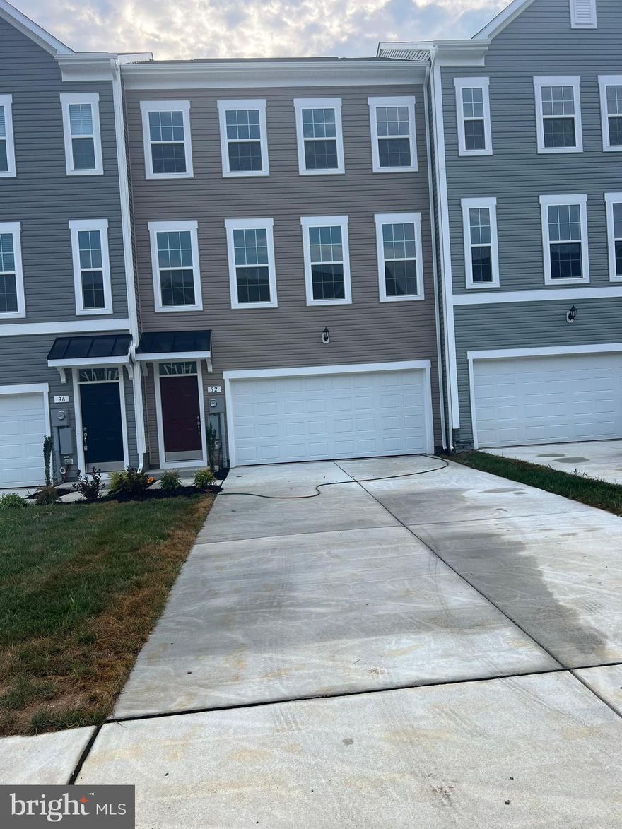 Ready to Move In! Overlook at Riverside - Brand New Townhome

This stunning townhome features 4 bedrooms and 3 baths. Upon entry, you'll find a finished bedroom with a half bathroom (going to build soon), adding extra space. The main level boasts luxury vinyl plank flooring throughout, a spacious living room with a powder room, and an eat-in kitchen with an island, granite countertops, stainless steel appliances.
The primary suite includes a generous walk-in closet and an en suite bath with a dual sink vanity and an oversized seated shower. The upper level is completed by two secondary bedrooms, a full bath, a linen closet, and a centrally located laundry room.

Additional features include a double car garage, a large driveway that can accommodate four cars, and additional guest parking. The community offers free amenities such as a dog park, children's park, basketball court, tennis court, and recreation area.

Located in a prime spot for I-81, Rt 11, and I-70 commuters, this home offers mountain views, is within walking distance to shopping and restaurants, and provides access to Spring Mills schools. It's also close to the interstate and just minutes from the MD line. This rental won't last long!