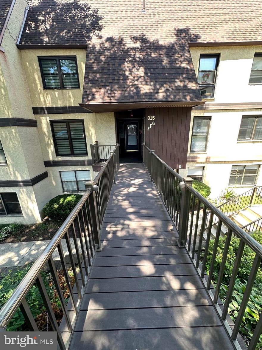 Charming 2-Bedroom 2.1 Bath Condo in Sought-After Green Tree Run!

Welcome to this beautifully maintained and updated 2-story condo nestled in the desirable Green Tree Run community in Philadelphia’s Roxborough neighborhood. This spacious home blends modern updates with warm, rustic charm—perfect for an owner-occupant or investor alike. Step inside to find a bright and inviting main level with rich wood accent walls that bring character and warmth to the space. Brand new windows with zebra blinds bathe the hardwood floors in natural light, creating a cozy yet contemporary atmosphere. The updated kitchen boasts brand new stainless steel appliances and freshly stained cabinetry, ideal for any home chef.  A convenient half-bath in the foyer off the kitchen completes the main level. Upstairs, you'll find new hardwoods throughout with two generously sized bedrooms  and new ceiling fans. The primary suite features a stunning stone accent wall, a walk-in closet, and a fully remodeled ensuite bath. A second fully renovated bathroom offers style and comfort for guests or family. Enjoy your morning coffee or unwind at night on the private outdoor deck, surrounded by serene woods—a true retreat so close to the City. The Trex walkway and recently replaced roof (via HOA) add even more value and peace of mind. Other features include a Nest smart thermostat, freshly cleaned HVAC and dryer ducts, and an updated laundry area with new washer and dryer. Community amenities are unmatched: indoor & outdoor saltwater pools, whirlpool, gym/fitness center, saunas, and the Treehouse event space. Plus, the association fee covers gas, heat, water, sewer, and trash. Owner pays for Electric only! Pet-friendly (dogs & cats allowed), with nearby trails along the Schuylkill River perfect for biking enthusiasts. Just minutes from vibrant Manayunk, major highways, and Center City—this home offers the best of convenience and tranquility. There is additional parking in any of the unnumbered spots. Don't miss your chance to own this gem on top of a hill in Green Tree Run! Please Note: Mirror in Primary Bath will be installed by early August!