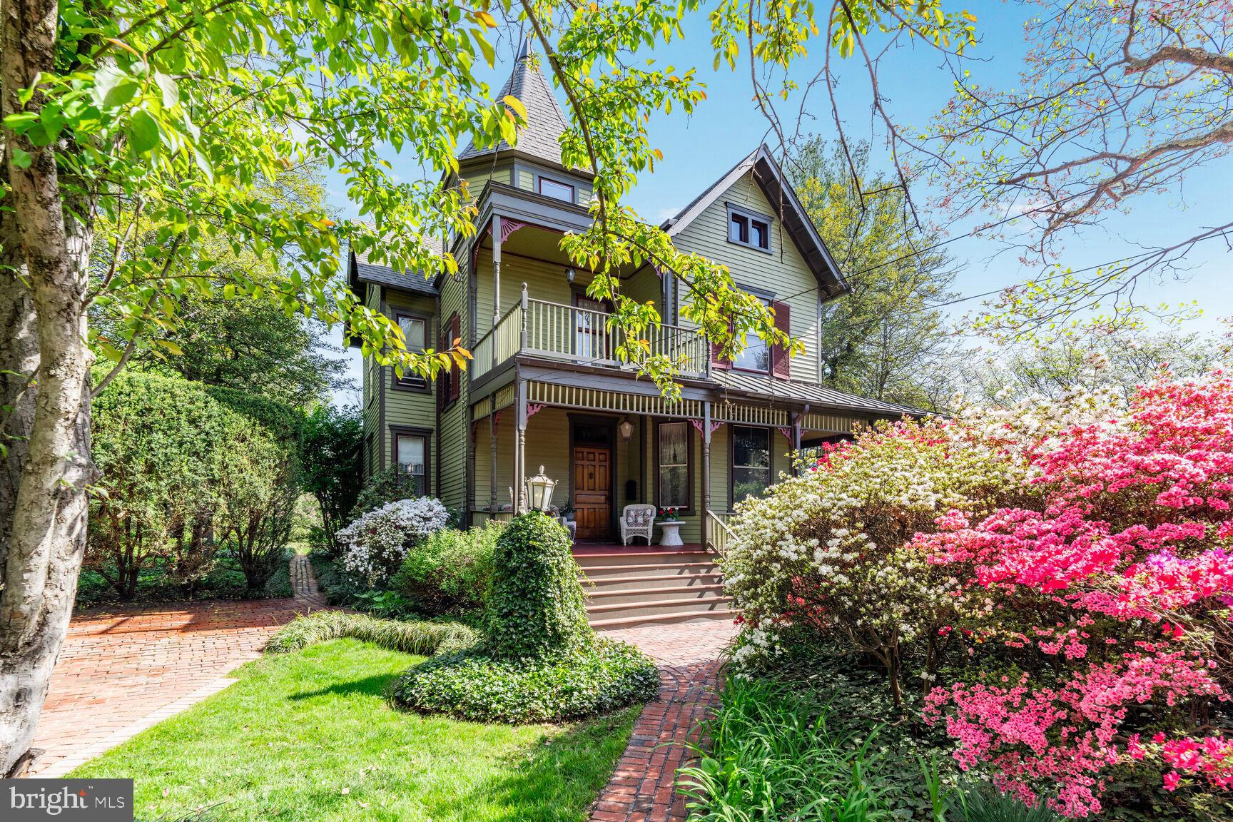 Stunning Victorian on a double lot in the heart of Kensington's historic district. Rare opportunity to own one of the most beautiful historic homes in the heart of Kensington’s historic district. Built in 1898 and in meticulous condition, this is a must see in person! This Queen Anne style architectural gem is beautifully sited on a double, .40-acre lot and has magnificent custom features not found in homes today- fabulous millwork, custom built in china cabinet, pocket doors, original fireplace mantels, front and back staircases, heart pine floors, transom windows, glass doorknobs, soaring ceilings , historic light fixtures, even a secret room! Ten foot ceilings on the first floor, nine foot ceilings on the second floor. Tour in person to see all rooms and the special features. The main level features a stately foyer with coat closet and gorgeous staircase, formal living room with bay window and gas fireplace, family room with fireplace and door to side deck, grand formal dining room large built in china cabinet and door the back porch, full bath, and masterfully renovated kitchen with custom cabinetry, granite countertops, stainless steel appliances, tin ceiling, pantry, and back stair to the second floor. The upper level includes four large bedrooms, hall closet, large renovated bath and stairs to the attic with lots room for storage and play. The lower level is a wonderful surprise with good ceiling height, ceramic tile floor recreation/guest room areas, full bath, outside egress, and laundry area with front loading washer and dryer. Please see floor plans. The outdoor living areas are amazing- large front porch, side porch , and rear covered porch , and a private brick patio. Upgrades include a 50 year shingle architectural roof with copper stand seam porch roofs and copper downspouts, new sewer and water lines, electrical 200 amp heavy up and electrical upgrades, relining of chimney flues, newly constructed chimney, new master water valve shut off, new hot water heater in 2023, dual zone AC, exterior recently repainted & more! location, location! Walk to the heart of Kensington and all it has to offer- restaurants, shops, multiple parks, weekly Farmer’s market, Noyes Children’s Library, Babycat Brewery & more. Just minutes to the entertainment and shopping districts of Chevy Chase Lake and Pike and Rose. A commuter’s dream close to two Metro shops, downtown Bethesda and just a mile to the Beltway. You will love the community spirit of Kensington. Prepare to fall in love with this very special home, property, and neighborhood!