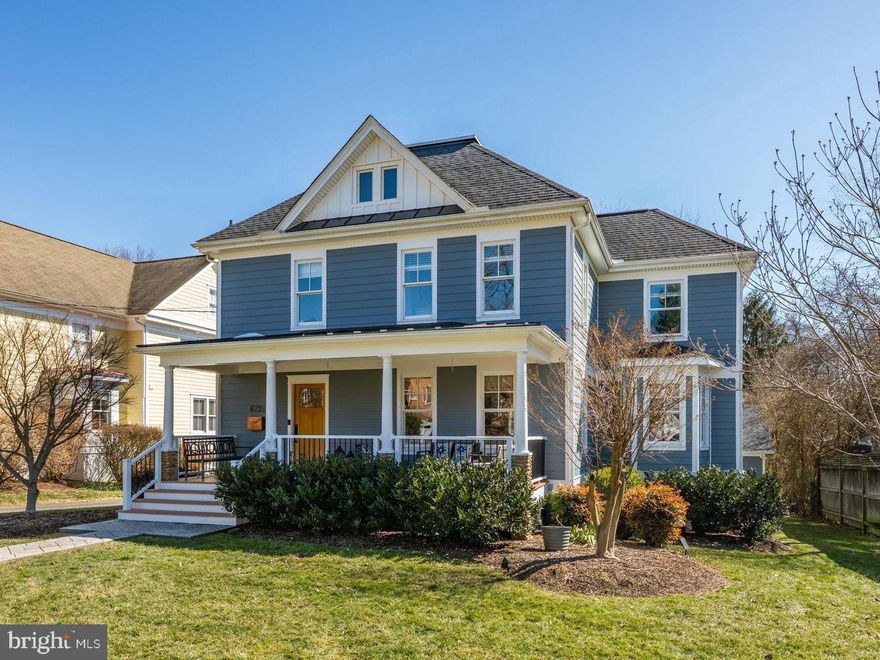 (On Market - Tuesday April 7th) Thoughtfully renovated and beautifully maintained, this exceptional Arlington foursquare blends timeless architecture with modern updates and an unbeatable location backing directly to over 4 acres of parkland at Charles Stewart Park. Located on delightfully flat lot with over 16,000 SF (0.37 Acres), this home was originally reimagined in a whole-house renovation in 2013 designed by noted architect Thomas Flack, AIA and executed by KohlMark Group, the home offers refined spaces, high-quality craftsmanship, and functional living for today’s lifestyle.
The exterior makes a striking first impression with James Hardie fiber cement siding (Boothbay Blue) and a CertainTeed Landmark PRO architectural roof, both installed in 2021 for lasting durability and curb appeal. Inside, the fully updated kitchen features modern appliances, custom cabinetry, and stylish finishes, while renovated bathrooms—including the upper-level hall bath renovated in 2022 and an en-suite bathroom renovated in 2019—provide comfort and sophistication.
Designed with flexibility in mind, the home includes 5 bedrooms and 3.5 bathrooms with 4 bedrooms and 3 full bathrooms located on the second floor including a convenient laundry room with a new Samsung washer and dryer (2025).  There is also a top floor office/studio suite, and a dedicated lower-level gym/bedroom #5/flex space.  Custom built-ins throughout the home including the study, mudroom, and primary bedroom, along with extensive attic and basement storage, ensuring everything has its place.
Outdoor living is equally inviting, with a large screened porch perfect for dining or relaxing, a professionally maintained flat yard with irrigation/sprinkler system in the front and rear installed in 2010, and a backyard fire-pit seating area added in 2023. The property backs directly to Charles Stewart Park, offering open views, green space, playgrounds, and fields.
Additional highlights include an extra-wide detached two-car garage with smart garage doors (Wi-Fi/Alexa Controlled) in-ceiling speakers in multiple rooms (Sonos-compatible) and a professionally installed security system (new console 2025).
Ideally positioned for convenience, the home is just a short walk to the East Falls Church Metro (Orange and Silver Lines) and close to I-66, making commuting to D.C., Tysons, and both Dulles and Reagan National Airports effortless. Enjoy easy access to Downtown Arlington and City of Falls Church, nearby farmers markets in both Falls Church (on Saturdays) and Westover (on Sundays), neighborhood shops including Stratford Garden, Rarebird Coffee Roasters, Godfrey’s, Northside Social and more. Located in the sought-after school district of Tuckahoe Elementary, Williamsburg Middle, and Yorktown High School. Very walkable to both Tuckahoe Elementary/Park as well as Bishop O’Connell High School.
This is a rare opportunity to own a turnkey, architect-renovated home with exceptional indoor-outdoor living in one of Arlington’s most desirable locations.