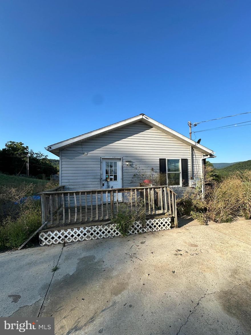 Discover the potential in this 3-bedroom, 1-bathroom home, nestled on a spacious .28-acre lot in a quiet Keyser neighborhood. With its convenient location and plenty of outdoor space, this property offers a fantastic opportunity for first-time buyers or investors.

Sold in "as is" and "where is" condition, this home is ready for your personal touch and updates. Whether you're looking to renovate or simply enjoy the peaceful setting, 148 Grant Street offers endless possibilities.

Don't miss this chance to make it your own—schedule a showing today!