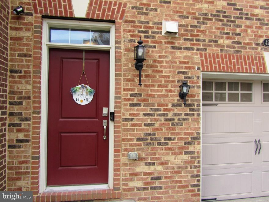 Exceptional townhome is available for rent and boasts numerous upgrades throughout. The elegant living and dining area showcase exquisite wall trim, creating an atmosphere of sophistication. Prepare culinary masterpieces in the stunning gourmet kitchen featuring upgraded cabinets, a vent hood, upgraded granite countertops, and stainless steel appliances. The living room and foyer exhibit upgraded wide engineered hardwood flooring complemented by a custom-designed TV stand. Additionally, the home is equipped with a humidifier, ensuring optimal comfort.
Residents of this community enjoy unparalleled amenities, including pools, tot lots, fitness centers, tennis and basketball courts, clubhouses, walking trails, parks, and engaging community events that foster a sense of pride. The location is exceptionally convenient, just minutes away from Rt 50, Loudoun County Parkway, Dulles Airport, shopping centers, and restaurants, making it an ideal choice for commuters. Townhome is located in Avonlea Reserve Community.
Extra Features; RO Drinking Water: Indulge in purified drinking water with the Reverse Osmosis (RO) system, which eliminates impurities through advanced filtration. Garden Beds with Grape Vines and Organic Vegetables: Cultivate your own grape vines and organic vegetables in the garden beds, providing a rewarding experience for green thumbs and fresh produce enthusiasts. Projector Screen: Immerse yourself in an exceptional entertainment experience with the included projector screen, perfect for movie nights or captivating presentations. Smart Thermostat and Lock System: Take advantage of the smart thermostat, likely an Eco bee, allowing remote temperature control and potential energy savings. The smart lock system offers convenient keyless entry and remote-control capabilities. Security System: Enjoy enhanced security and peace of mind with the existing security system, providing comprehensive protection fo r you and your home. (Contract is needed with security company). Garage with Storage Racks: Maximize storage space and keep belongings organized with the garage's built-in storage racks. Grill and Patio Furniture: Relish in outdoor living with the provided grill and comfortable patio furniture, creating an inviting space for relaxation and gatherings.