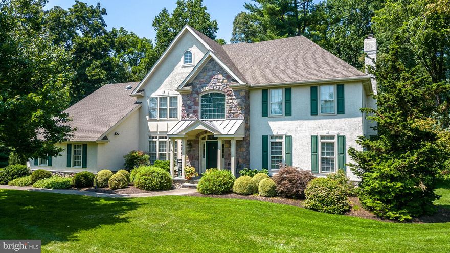 This is an exquisite custom built home perched on a cul-de-sac in Buckingham township, just minutes from the center of Doylestown. Elegant throughout, you will find the property in excellent condition with spacious, yet charming living areas. The central vacuum makes cleaning a more pleasant chore.  The rear yard and professionally landscaped  gardens feature many varieties of plants and flowers, the patio backs up to the Doylestown Borough park which offers tranquility and privacy. Some of its very special features include an ELEVATOR making all three floors accessible to all, newer kitchen with stainless appliances including a large refrigerator with  separate refrigerator drawers ,  large granite counters,  family room with a native stone fireplace, and a  delightful sunroom perfect for year-round viewing of the gardens and wildlife. The home office has built in bookcases and desk overlooking the back yard with custom moldings. The three car garage offers ample parking and storage  space. This beautiful residence has been meticulously maintained and ready to enjoy.