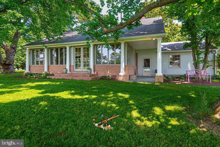 This delightful  3-bedroom, 2-bathroom brick house was significantly renovated in 2011, including the addition of a large second story area, ready to integrate as finished space. Located at the head of Hunting Creek just off the Miles River, this home offers stunning sunrise and sunset views across the broad waters of the Miles River and Hunting Creek. The view is private with a natural island across the river abounding with wildlife, nesting Bald Eagles, Blue Heron and Osprey. A birder’s heaven with migrating waterfowl showing up in every season – 5,000 Canvassbacks spent 2 weeks by the dock this February along with swans and a flock of Bufflehead.  The 2.68 acre site features mature specimen trees.  Oak, Magnolia, Dogwood, Cedar, Maple and Ginko attract a wide variety of songbirds too, as do the professionally designed sun, shade and Camellia gardens nestled around the property.
The home is a boater’s paradise with  250 Feet of stabilized shoreline featuring a 250-foot dock 
with two deep-water (7 feet MLW) slips – 1 sail; 1 power. The larger slip will accommodate up 
to 12-foot beam.  Fish and crab from the dock or fish for trophy rockfish with just a half-hour’s ride to 
the Bay. Annapolis is 1 hour by boat or car.
This home is set up for entertaining with an open circulation pattern: which
serves 35 people buffet style or 25 for a plated dinner. The modern kitchen was cook-designed 
for convenience and entertaining. The kitchen features a large granite buffet serving area and a 
separate butler serving area. The kitchen is also designed to feature cooking classes from the 
stovetop at a raised granite countertop.
The house and all systems have all been professionally engineered to enhance the comfort and 
maintainability of the home. A 3-zone geothermal system maintains all-season temperatures to 
within +/- 1°F at an average of $200 per month. The house features a fully conditioned crawl 
space that keeps floors warm under-foot. The home is foam insulated and draft 
free. LP gas runs a Rinnai tank-less water heater and the kitchen cooktop. A  BAT nitrogen reduction septic system, installed in 2009, functions well. New electric service installed in 2015 with AFCI 
breakers and whole-house surge protection. ADT fire protection. All systems are designed to be 
as maintenance-free as possible.