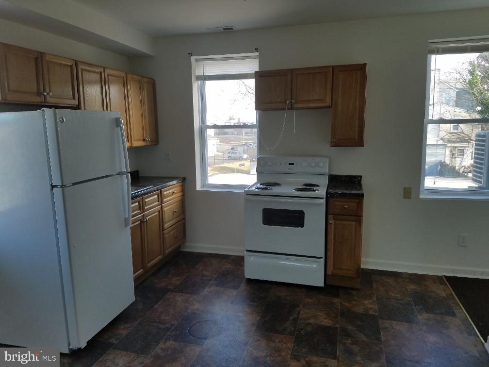 Great Investment Possibility! Rehabbed Single Quadraplex. Convenient to transportation. Property currently generating over 42k gross income. First Floor tenants currently on month to month lease. 2nd Floor tenants leases thru January and February 2020. Seperate Heat, Electric, Hotwater, AC. Call to show!