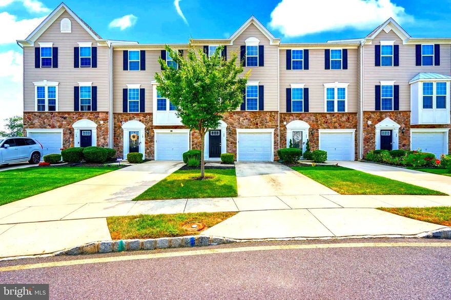 Welcome to this spacious and modern townhouse featuring 3 levels of comfortable living. The open floor plan includes a bright living area, a contemporary kitchen with ample cabinet space, and stylish bathrooms with updated fixtures. Enjoy the convenience of a private garage, upper-level deck, and a fenced-in backyard with a concrete patio—perfect for relaxing or entertaining. Additional features include recessed lighting, a dual vanity in the primary bath, and low-maintenance outdoor space. Located in a quiet community near schools, parks, and shopping.