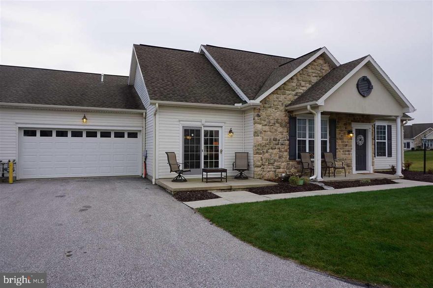 You will love this condo!  It's in excellent condition with exceptional features: cherry cabinets with slide-out shelving, beautiful granite counter and back splash, SS appliances, tap faucet, recessed lighting, upgraded vanities, and newer carpeting.  This is the one!