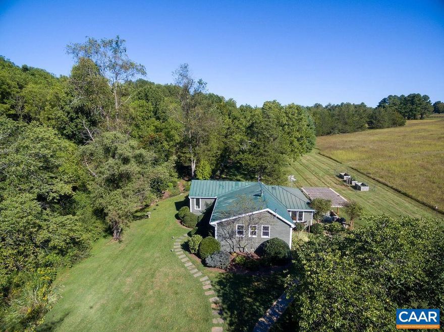 Looking for a protected country getaway w/ glorious pastoral views in the heart of Ivy? You've found it! This spectacular 8+ acre property includes an adorable 1,390 square foot cottage w/ vaulted ceilings & open floor plan overlooking enchanting gardens, expansive lawn & neighboring pasture protected by conservation easement. This absolute gem of a property is located less than 20 mins to UVA in the Ivy Elementary district & borders 160+ acres of Rural Preservation Tract in neighboring Far Hills. Property is NOT in an HOA & offers numerous options (per county approval): enjoy the cottage as it is, expand the existing cottage to suit your needs or build your dream home in another location & convert the existing home into an accessory dwelling. Comcast/ Xfinity cable is on Eden Ln. but needs to be brought to the home. First time on the market in 30 years - don't miss!,Formica Counter,Painted Cabinets,Wood Cabinets,Fireplace in Living Room