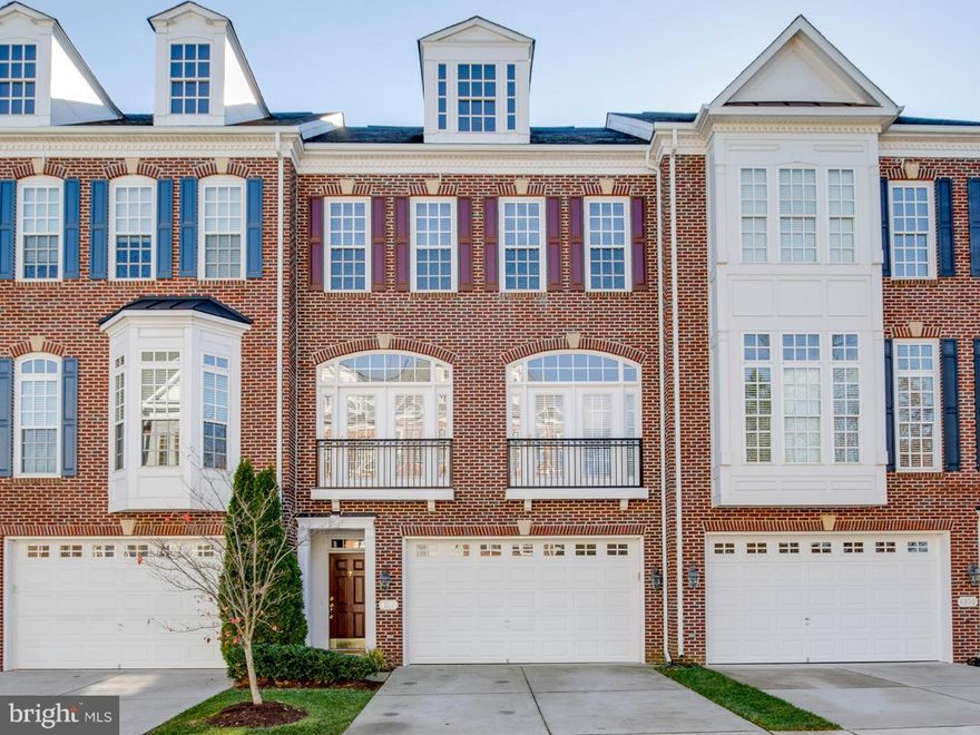 Beautiful All Brick Townhouse in Historic Downtown Fairfax, Fairfax Gateway! Three levels, 3Bedrm, 3.5 baths, with over 2600 sq ft of living space! Hrdwds, tray ceiling, custom mouldings. Gourmet kitchen, with Stainless appl, venetian granite, 42 in cherry cabinets, center island plus a walk in pantry. Deck and stone patio with fenced rear yard. Backs to trees! Walk to GMU, shops and restaurants!