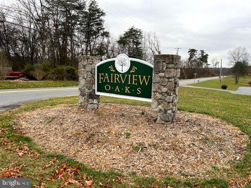 Beautiful setting with 1.22 acres in a well maintained community.
Perfect location   minutes to downtown Berkeley Springs and I-70!
Ready to build with city water, paved roads and underground utilities! Older perc on file w/health dept.
Hurry   not many  building lots left in Fairview Oaks!