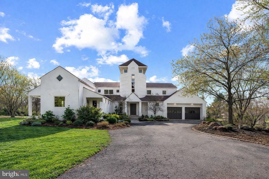 Set on 1.35 acres in a tucked-away neighborhood off Falls Road, this thoughtfully renovated residence offers a refined balance of comfort, scale, and modern design.  Every detail has been carefully considered,  creating a home that feels both elevated and effortlessly livable. The complete exterior of the home was freshly painted to perfection. A welcoming foyer with a newly redesigned staircase introduces the main level, where natural flow and proportion define the space. The living room, anchored by a wood-burning fireplace, transitions seamlessly into a formal dining area—ideal for both intimate gatherings and larger entertaining. At the center of the home, the kitchen is appointed with a full suite of Viking appliances, including a gas range, complemented by a generous island and sunlit breakfast nook. Additional living spaces provide flexibility and depth, including a private office or lounge, a secondary family room,  a main-level laundry room as well as bedroom with en-suite bath—well suited for guests or multigenerational living. The upper level is anchored by a spacious primary suite, offering a calm, private retreat with a beautifully appointed en-suite bath. 
The lower level offers a distinct extension of the home, complete with its own bedroom with private entrance. A recreation room, wet bar, dedicated office or optional media room, extensive storage, and two full baths create an ideal setting for entertaining, extended stays, or independent living. Surrounded by open space, the property offers a sense of privacy while remaining convenient to the area’s most desirable destinations. A two-car garage and additional parking complete the offering. A home defined by thoughtful updates, comfortable elegance, and understated sophistication.
