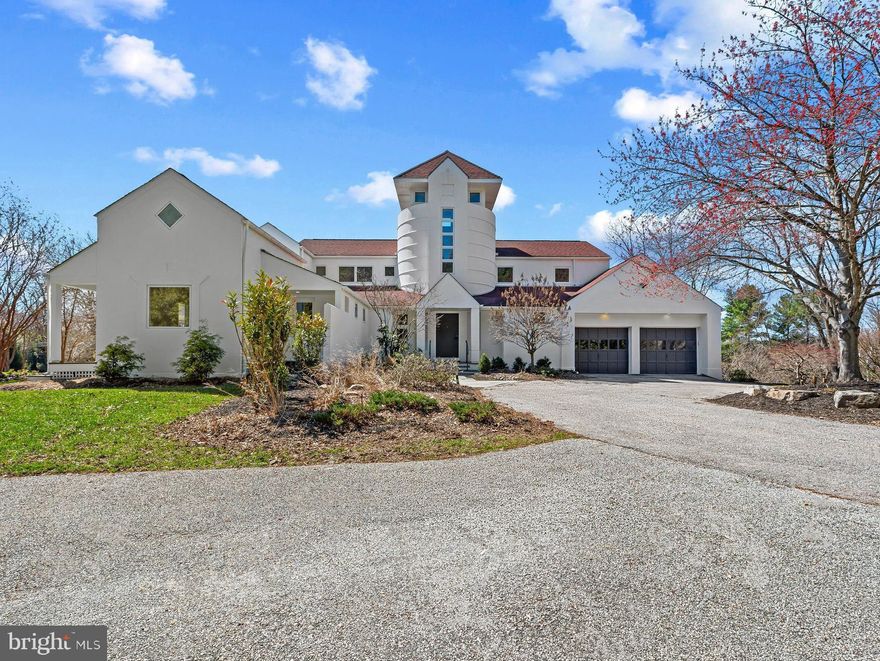Set on 1.35 acres in a tucked-away neighborhood off Falls Road, this thoughtfully renovated residence offers a refined balance of comfort, scale, and modern design.  Every detail has been carefully considered,  creating a home that feels both elevated and effortlessly livable. The complete exterior of the home was freshly painted to perfection. A welcoming foyer with a newly redesigned staircase introduces the main level, where natural flow and proportion define the space. The living room, anchored by a wood-burning fireplace, transitions seamlessly into a formal dining area—ideal for both intimate gatherings and larger entertaining. At the center of the home, the kitchen is appointed with a full suite of Viking appliances, including a gas range, complemented by a generous island and sunlit breakfast nook. Additional living spaces provide flexibility and depth, including a private office or lounge, a secondary family room,  a main-level laundry room as well as bedroom with en-suite bath—well suited for guests or multigenerational living. The upper level is anchored by a spacious primary suite, offering a calm, private retreat with a beautifully appointed en-suite bath. 
The lower level offers a distinct extension of the home, complete with its own bedroom with private entrance. A recreation room, wet bar, dedicated office or optional media room, extensive storage, and two full baths create an ideal setting for entertaining, extended stays, or independent living. Surrounded by open space, the property offers a sense of privacy while remaining convenient to the area’s most desirable destinations. A two-car garage and additional parking complete the offering. A home defined by thoughtful updates, comfortable elegance, and understated sophistication.