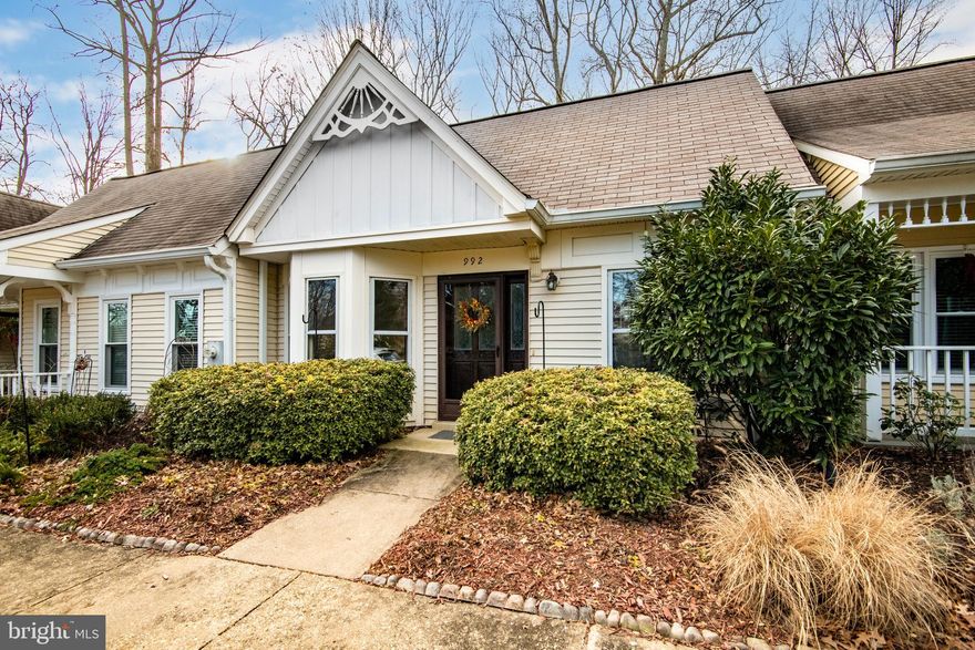 Experience easy living in Annapolis’ premier 55+ community at this charming 2-bedroom, 2-bath villa in Heritage Harbour, perfectly positioned just steps from the community lodge and amenities. Freshly painted with brand-new flooring throughout, this home offers a bright, clean, and welcoming feel from the moment you walk in. The spacious layout flows effortlessly from the living and dining areas, making it ideal for both everyday comfort and entertaining. Large windows invite in abundant natural light and showcase peaceful views, creating a relaxing atmosphere year-round. Living at Heritage Harbour means enjoying a true resort-style lifestyle, with two swimming pools, golf course, tennis courts, fitness center, library, billiards room, walking trails, and a vibrant community lodge offering countless clubs and activities. Residents also love the convenience of the on-site restaurant for easy dining and socializing. Ideally located near shopping, restaurants, Anne Arundel Medical Center, and just minutes from historic downtown Annapolis, 992 Riversedge delivers comfort, convenience, and community in one of the area’s most sought-after active adult neighborhoods. Enjoy relaxed, low-maintenance living. Welcome home!