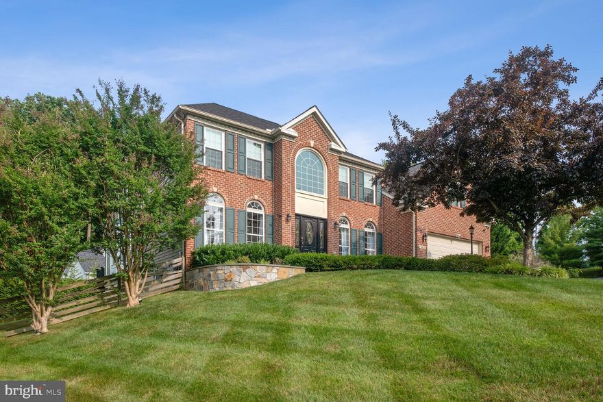 Your hilltop retreat at 6920 Mystic Woods Way! This 5-bedroom, 3.5-bath brick colonial home offers more than 5,000 square feet of living space across 3 levels and boasts numerous updates and modern features including hardwoods floors, expansive surround windows, and soaring ceilings. The main level includes a formal living room, separate dining area, and a fully renovated kitchen featuring quartz counters, new cabinets, and high-end appliances not to mention a walk-in pantry and separate breakfast nook. Also on the main level are a spacious sunroom and a full office to ensure privacy and a sense of separation for all of your work-from-home needs. The upper level features three large bedrooms in addition to the vast primary suite and newly renovated bath with both dual vanities and walk-in closets in addition to a Jacuzzi tub and separate stall shower. Moving to the home’s lower level, a full theater and large screen/projector awaits along with a billiards area and an additional bedroom and full bath that can serve as an in-law suite or private haven for longer-term guests. Last but not least, multiple entrances lead to the home’s sprawling backyard and attached composite deck, perfect for outdoor entertaining/dining, working al fresco, or relaxing in peaceful view of the manicured grounds, complete with privacy trees. Situated within the River Hill High School zone, additional school district details can be found at the Howard Country Public Schools Website.  Additional conveniences await at the nearby River Hill Village Center, Maple Lawn shops/dining options, and multiple routes with speedy access to Washington, D.C. to the south and Baltimore to the north. This home truly has it all.