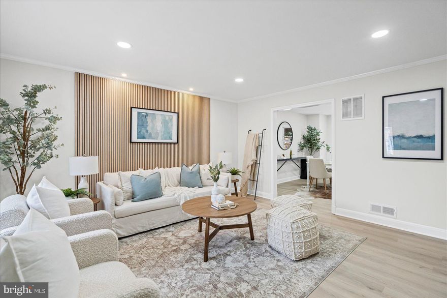 Welcome to this beautifully renovated home in the heart of Belair-Edison. Featuring a fresh, neutral color paint throughout, this property blends modern style with everyday comfort. The large living room is highlighted by stylish slatted wood accents, which continue onto the kitchen island for a warm, contemporary feel. The kitchen offers plenty of cabinet space, including a pantry and additional cabinets surrounding the refrigerator—perfect for storage and organization. Upstairs you’ll find 3 spacious bedrooms and a tiled, full bathroom. The fully finished basement adds incredible flexibility and can be used as a rec room, 4th bedroom, or home office. It also includes a second full bathroom and a utility room with laundry.
Enjoy outdoor living with a large fenced-in backyard and relax on the covered front porch. This move-in-ready home checks all the boxes. You do not want to miss this one!