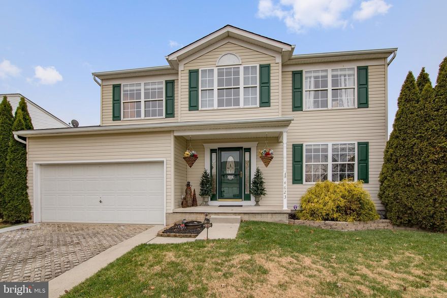 SO much to love about this home! NEW carpet, NEW refrigerator, gas range, dishwasher AND hot water heater! GREAT floor plan with formal living & dining & large eat-in kitchen opens to family room w/gas fireplace! Entertainer's deck w/built-in BBQ area & privacy fenced backyard! Large, light-filled bedrooms! "Retreat-like" Master Suite! HUGE walk-out basement w/laundry area & tons of storage!