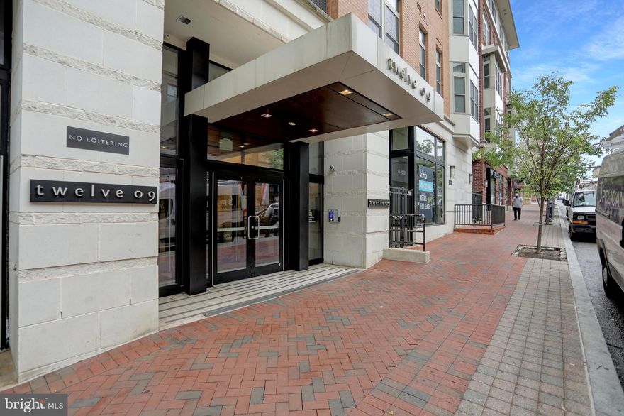 This stunning, sunlit two-bedroom, two-bathroom condo in the heart of Mount Vernon offers modern living with a sleek design and spacious layout. Featuring TWO separately deeded parking spaces and TWO storage units. This condo also has a a beautifully updated kitchen with granite countertops, stainless steel appliances, and ample storage, this home is perfect for cooking and entertaining.

The open-concept living and dining areas are filled with natural light, thanks to large windows offering fantastic city views. The well-sized bedrooms are inviting and comfortable, with plush brand new carpeting and plenty of closet space. The primary suite includes a well-appointed en-suite bathroom with a shower and a large vanity, while the second bathroom is equally spacious and functional.

Additional highlights include an in-unit washer and dryer, ample storage space, and a private balcony for enjoying the outdoors and the condo has been wired with Cat 6 ethernet cabling. A fitness center and private courtyard add to the buildings terrific amenities. 

Located in a prime area close to all the excitement of downtown Baltimore, Penn Station, and some of Baltimore's best restaurants - this condo is ideal for anyone seeking both luxury and practicality in a vibrant city setting.