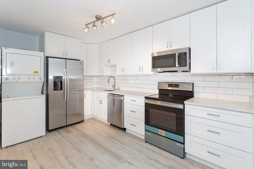 Spacious, sun-filled, and open 2-bedroom, 2-bath condo featuring two en suite bedrooms and gleaming hardwood floors in the main living area. Enjoy front-facing views from the expansive private balcony. The kitchen and bathrooms have been beautifully renovated with modern finishes! Additional storage is available.

Experience resort-style living with 24/7 security and access to The Rotonda's newly renovated amenities, including indoor and outdoor pools, a fitness center, basketball court, community center, walking trails, on-site shops, and more. Ample parking provided.

Ideally located within walking distance to the Silver Line Metro and all that Tysons and The Boro have to offer—Whole Foods, Wegmans, fine dining, entertainment, theaters, bowling, and more!