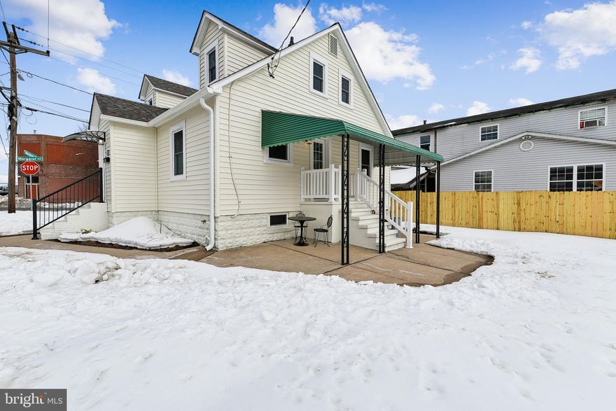 ✨ Beautifully Renovated Corner Home in Prime Essex Location ✨

Welcome to this charming and thoughtfully updated single-family home offering 3 spacious bedrooms plus a sunroom/home office and 2 stunning full bathrooms — perfect for today’s flexible lifestyle. Nearly every inch has been refreshed, making this home truly move-in ready.

Enjoy a bright, modern kitchen featuring brand-new cabinetry, Caesarstone quartz countertops, and stainless steel appliances, all installed in Winter 2025. The home shines with new double-pane tilt-in windows, including six new windows and cozy window seats in the second-floor primary suite — complete with hidden storage and additional closet space.

Comfort and efficiency are top priorities with a new mini-split HVAC system, upper-level insulation, new vinyl siding, 6-inch rain gutters, and a new roof (2024). Refinished hardwood floors, fresh paint throughout, and beautifully updated bathrooms add timeless style and warmth.

Outside, enjoy relaxing or entertaining under the large rear awning covering the back porch and barbecue patio, along with a new privacy fence, new front awning, new railings, and a detached one-car garage. The full unfinished basement offers abundant storage and includes a laundry tub and brand-new washer and dryer.

Private driveway, as well as,  plenty of street parking along both sides of Maryland Ave.

Additional peace-of-mind upgrades include new CPVC plumbing, new sump pump, a chimney cap, a one-year termite contract, and an oil furnace under maintenance contract.

📍 Unbeatable Location
This corner property is just:
• One block from the post office, shopping, dining, and public transit
• Minutes to major shopping centers and employment hubs
• 15 minutes to Johns Hopkins and area hospitals
• Close to excellent schools and Essex Community College
• Ideally situated between two rivers with quick access to the Chesapeake Bay, beaches, and waterfront parks

🌊 Comfort, convenience, and coastal charm — this home truly has it all.