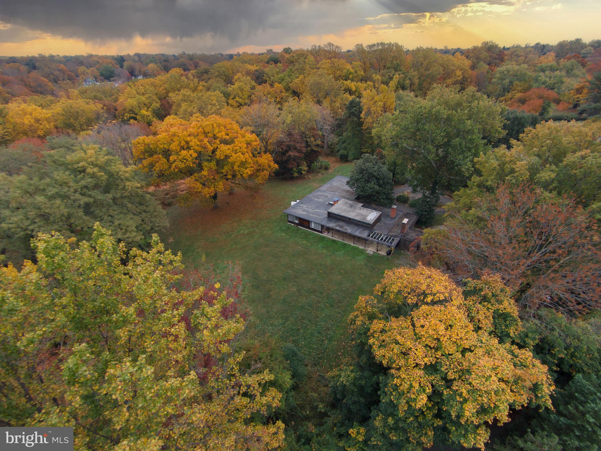 Live authentically. Truly an exceptional piece of land. Two small overgrown ponds. Former sheep farm. 8.15 acres of rolling hills & total privacy. Mid century house in need of total renovation or removal. Two outbuildings. Estate living in town. Value is in land. Do not visit property without appointment. Tenant occupied. Unique setting that you can't repeat. Quite remarkable that this even exists. Walking distance to the gorgeous trails arond Lake Roland. An oasis in the county. Moments from everywhere you want to be. Realize your vision. The art of uniting human and home. House is severe disrepair no interior showings at that time. Photos are for inspiration only.