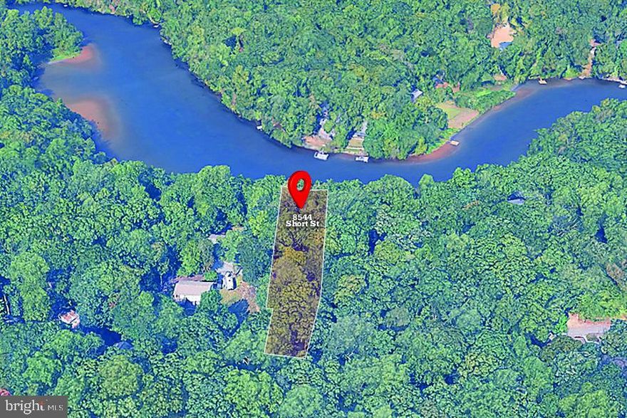 Build your dream home on this 0.38-acre (16,613 sq ft) wooded lot backing to Lake Jackson in the Manassas area. The property offers a peaceful natural setting with direct lake frontage. Zoned A-1 (Agricultural) in Prince William County, the land allows for residential uses permitted under the zoning. A survey has been completed. A great opportunity to build a custom home or hold as an investment in the Lake Jackson area, conveniently located near Route 234 and surrounding communities.