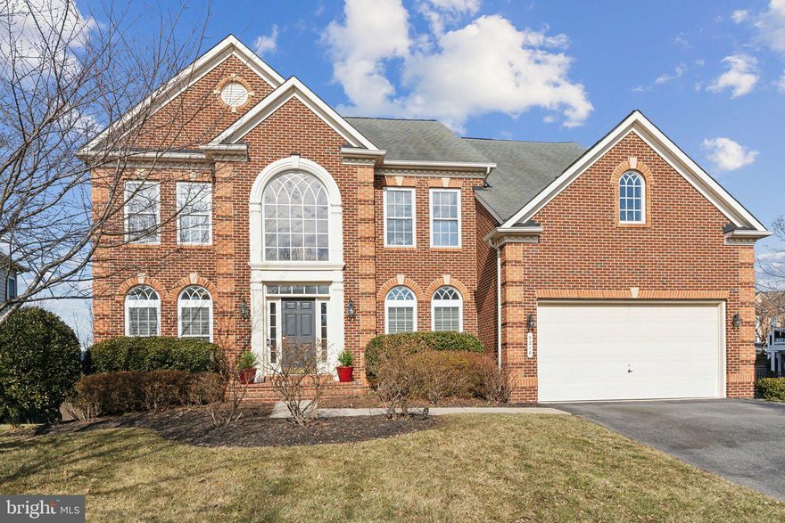 STUNNING, PICTURE PERFECT HOME IN HIGHLY SOUGHT AFTER VILLAGES OF URBANA. Fully fenced prime .2 acre lot backing to conservation space with spectacular views! Spacious and luxurious with over 5,500 square feet of living space. As soon as you walk into the two-story foyer, you are greeted with a curved staircase, beautiful hardwood floors and designer touches throughout. The open concept flows from the elegant foyer to the main level rooms with soaring ceilings and impeccable grand design and finishes. The sun filled family room features custom built-ins, a gas fireplace, a back staircase and floor to ceiling windows allowing natural light to flood in. A beautifully renovated gourmet center-island kitchen is a chef’s delight with upgraded appliances, custom cabinetry, an oversized island with seating for 5  and a breakfast nook with a custom server/wine bar. The formal dining room and living room are both spacious, yet comfortable and the perfect place for entertaining. The main level is complete with a private study elegantly renovated with custom shelving and French doors offering a quiet place to work. Completing this impressive main level is a half bath, a walk in pantry and a convenient laundry room with access to the 2 car garage. The upper level offers an expansive primary suite wing with immaculate views, a sitting room and a large walk in closet. Relax in the primary bath with a soaking tub bathed in natural light, double vanity sinks and a walk-in glass shower. Complimenting this level are three additional bedrooms, each with large closets, and a full bathroom. The walk-out lower level has an oversized great room with a wet bar, a bonus room, a full bathroom and plenty of storage. Upgraded features include new HVAC (2022), new hot water heater (2019), new washer/dryer (2021), renovated basement (2023), renovated kitchen and new appliances (2021), new flooring and upgraded lighting (2021), freshly painted (2021), renovated study (2021). The back deck, lower patio and yard are private with wooded views and perfect for entertaining. Great Villages of Urbana location close to the pool and community center. Enjoy community amenities such as tennis and basketball courts, fitness center, walking trails, elegant clubhouses, and two swimming pool complexes with water slides and a lazy river. Nearby, you’ll find the state-of-the-art YMCA, Blue Ribbon public schools, and Urbana District Park. With easy access to I-270, commuting is a breeze. Schedule your private showing today!