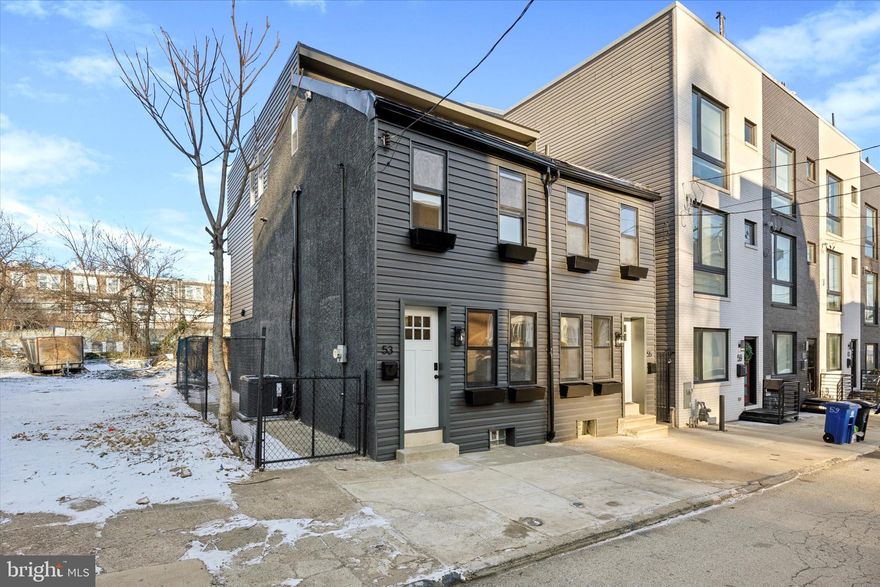 Welcome to 53 E Sharpnack Street, a beautifully renovated row home set in the desirable neighborhood of East Mount Airy, Philadelphia. This charming property offers brand new modern updates, making it completely move in ready.With 4 bedrooms, 3 full baths,  a generous living space, and a brand new kitchen this home is perfect for entertaining. Step inside this light and bright home with classic yet modern fixtures and aesthetics.  The living room features light vinyl flooring and an inviting open-concept layout that flows seamlessly into the dining area and  kitchen. The kitchen has been fitted with quartz countertops, stainless steel appliances, and tons of cabinet space. Step out the side door to your large fenced in backyard to enjoy more private entertaining space. On the second floor, you’ll find two bedrooms, each with their own bathrooms. The primary bedroom features a large walk-in closet and its own ensuite bathroom. The second bedroom, also has its own bathroom right next door.  The bathrooms both feature bright modern finishes. The third floor features two more bedrooms and another full bathroom as well. The concrete basements offers a plethora of opportunities; whether you're looking to put together a home office, another entertainment space, a home gym or additional storage - the possibilities are endless. Located just moments from local shops, parks, and public transportation, this home provides the ultimate convenience. The luxury of the brand new finishes paired with the desirable location make this property your perfect home base. Make 53 E Sharpnack Street your new home! Schedule your showing today!