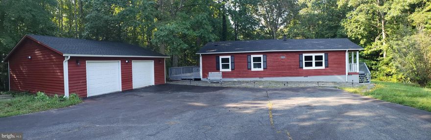 Completely renovated 3 Br/2 Bathroom Rambler on 5 acres!  Like new from top to bottom including new roof on both house and garage, new windows, laminate and carpet floors, kitchen including granite counter tops and SS appliances, recessed lighting, both bathrooms renovated, new garage door openers and propane tank!  Privacy and quietness all around. Come take a look today before it's gone!